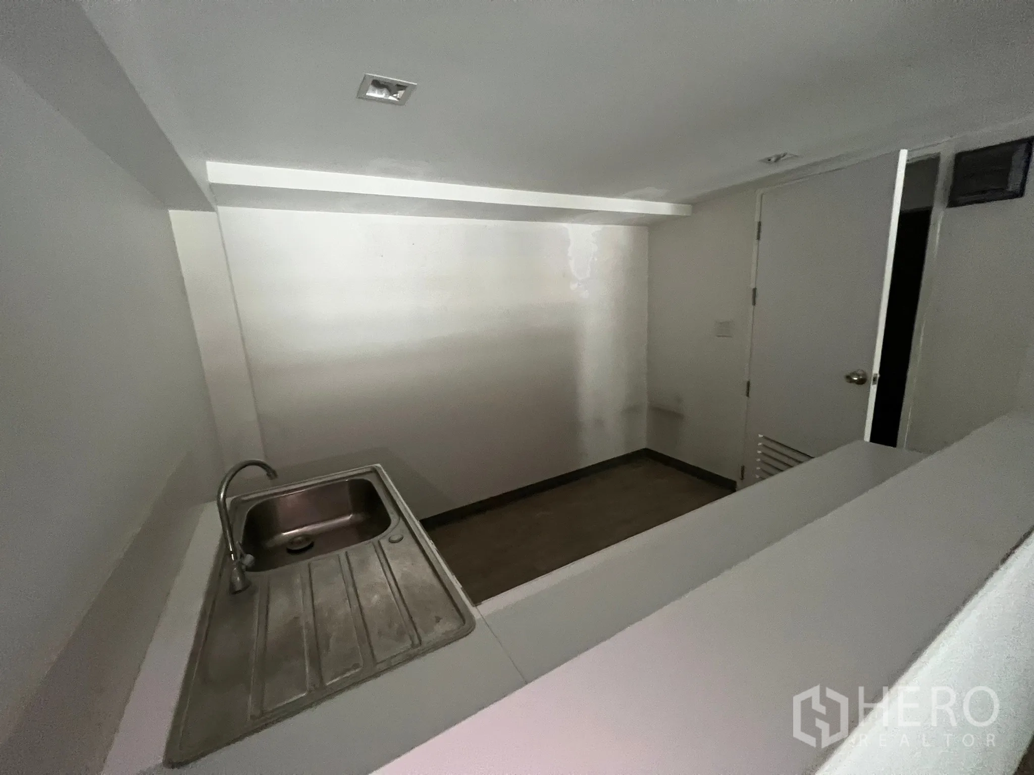 Retail Space for rent in Watthana, Bangkok - Compact pantry area with a stainless-steel sink and counter.