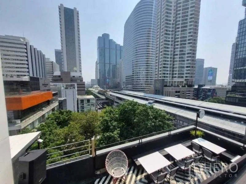 Retail Space for rent in Bang Rak, Bangkok - City view from terrace overlooking BTS tracks and treetops.