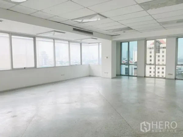 Office Space for rent in Chatuchak, Bangkok - Corner office floor with wraparound windows overlooking the Bangkok skyline.