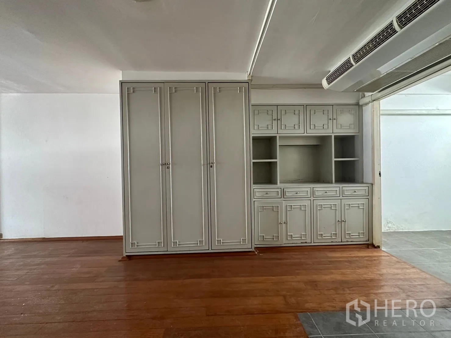 Retail Space for rent in Watthana, Bangkok - Built-in gray cabinetry and shelving beside a tiled wet area