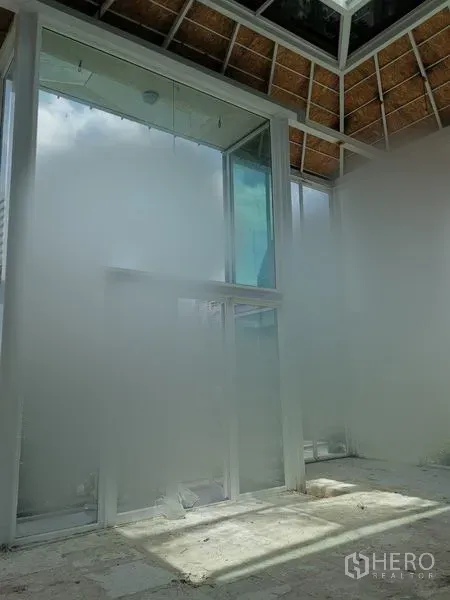 Retail Space for rent in Watthana, Bangkok - Double-height glass atrium flooding the retail space with natural light.