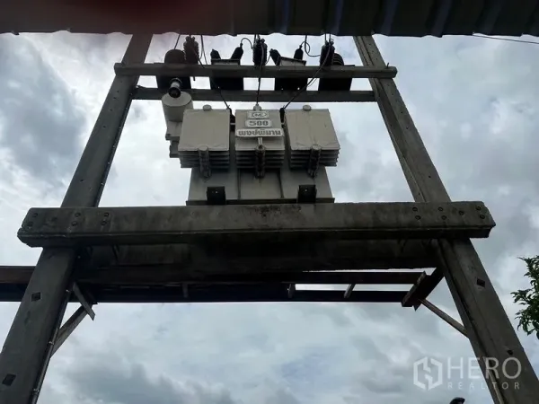 Factory for rent in Lam Luk Ka, Pathum Thani - On-site electrical transformer providing heavy-duty three-phase power supply.