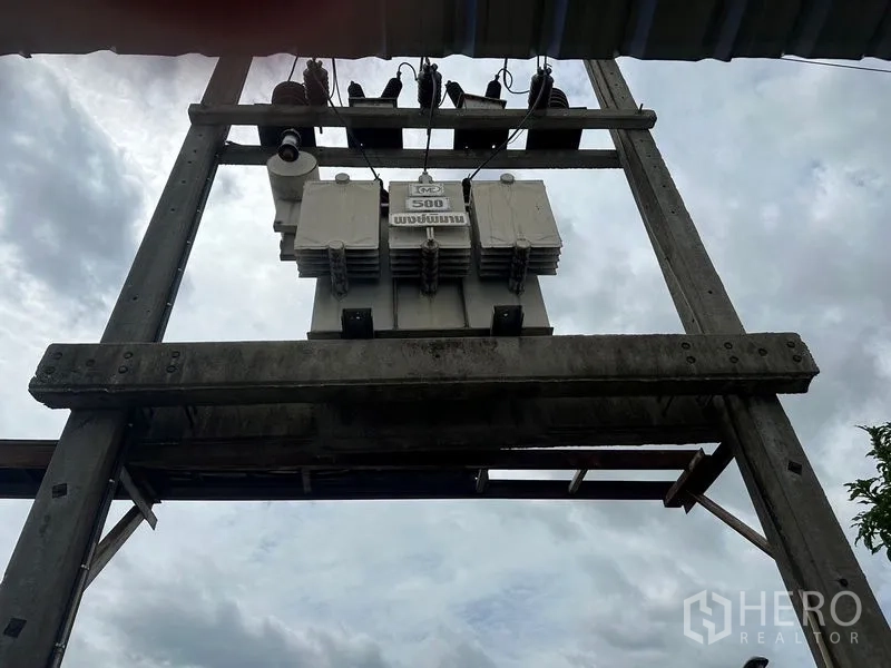 Factory for rent in Lam Luk Ka, Pathum Thani - On-site electrical transformer providing heavy-duty three-phase power supply.