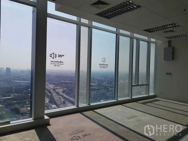 Office Space for rent - Corner office zone with tall glazing offering skyline views and acoustic insulated windows.