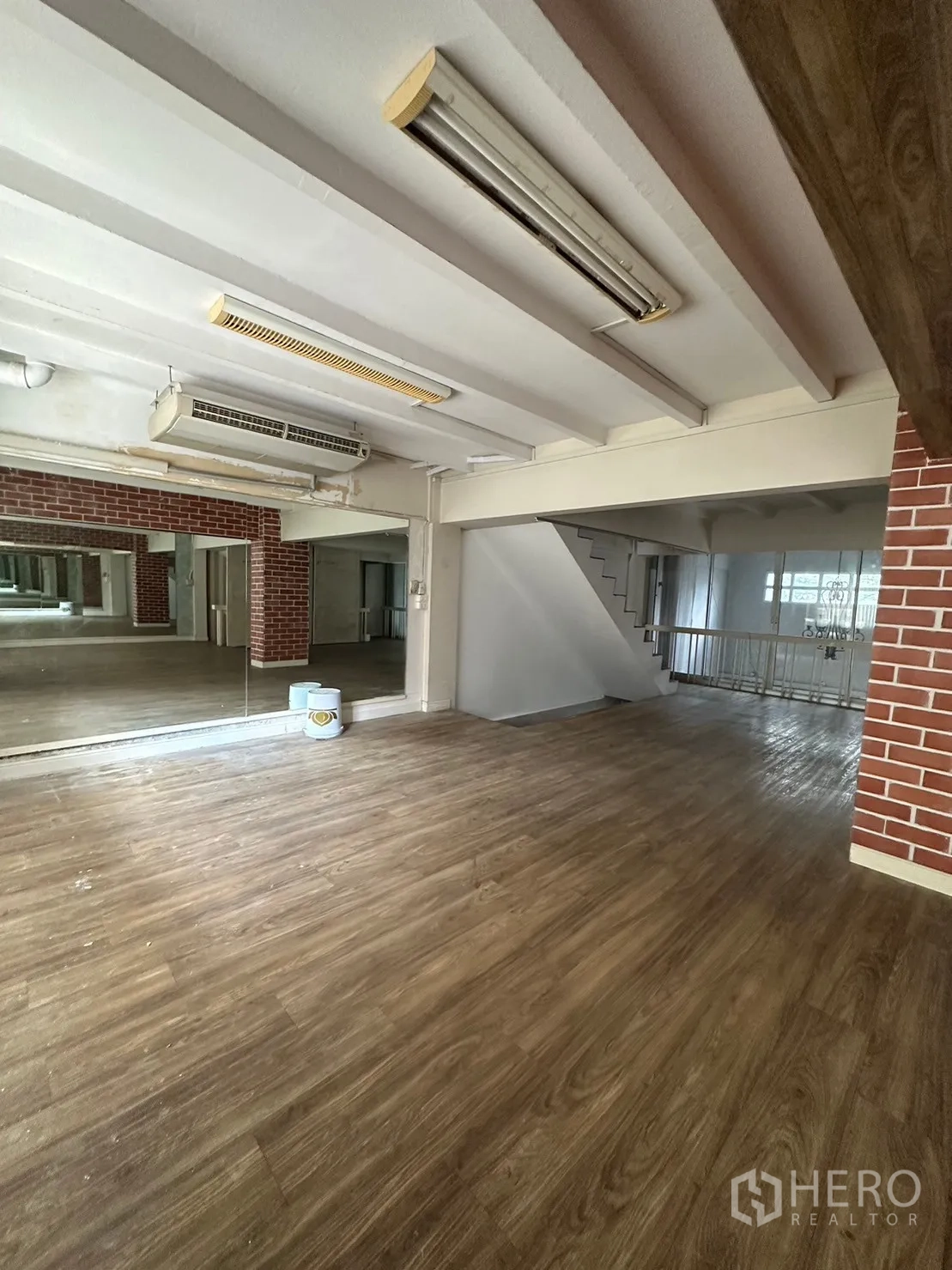 Retail Space for rent in Watthana, Bangkok - Studio area with mirror wall, wood floor and stairway access