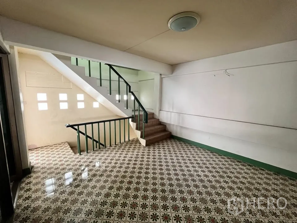 Detached House for rent in Suan Luang, Bangkok - Staircase and landing with vintage patterned tiles.