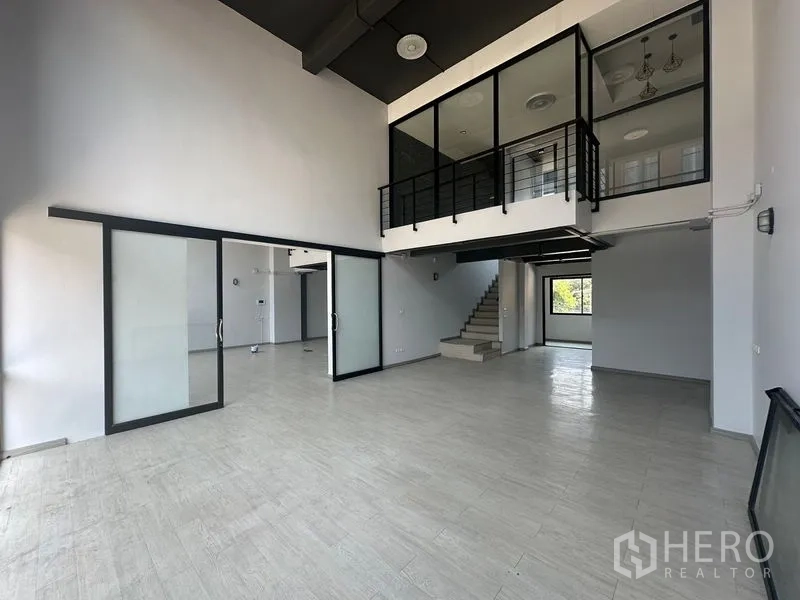 Home Office for rent - Open space with mezzanine offices and glass walls ready for fit-out.