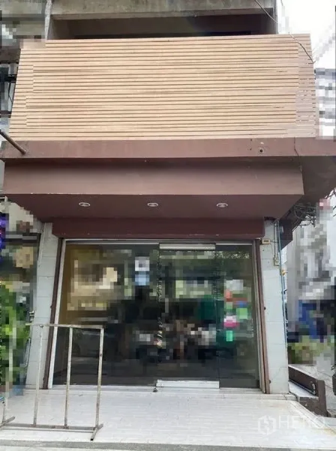 Retail Space for rent in Sathon, Bangkok - Street-level retail storefront with wide glass entrance and brown awning in Sathon.