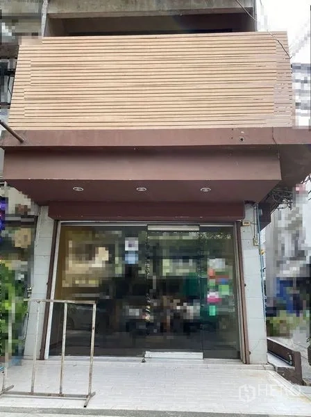 Retail Space for rent in Sathon, Bangkok - Street-level retail storefront with wide glass entrance and brown awning in Sathon.