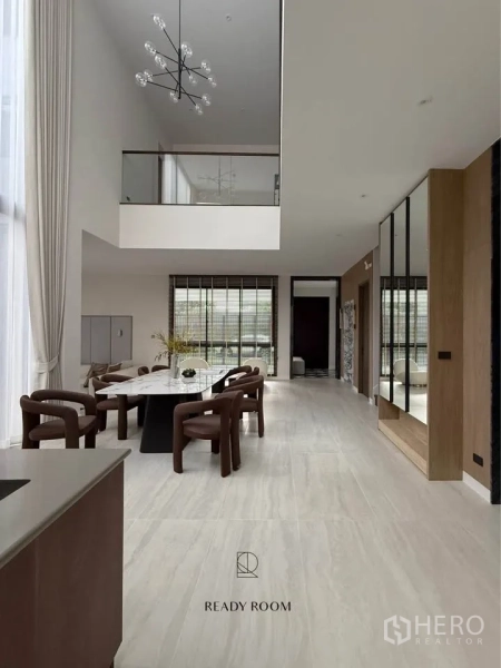 Detached House for rent in Bang Kapi, Bangkok - Private home elevator framed in marble beside plush lounge chairs.