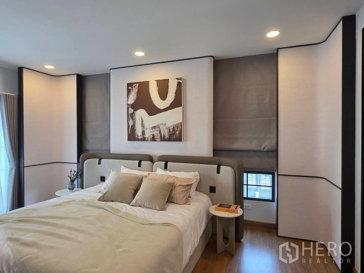 Detached House for rent in Bang Phli, Samut Prakan - Primary bedroom with statement headboard, layered blinds, and artwork.