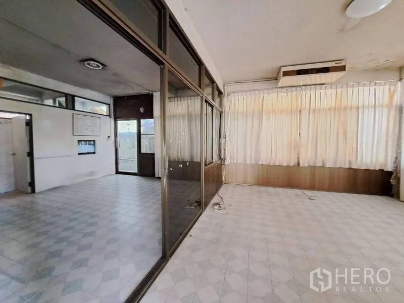 Retail Space for rent in Sathon, Bangkok - Interior area with glass partitions and full-height curtains dividing rooms.
