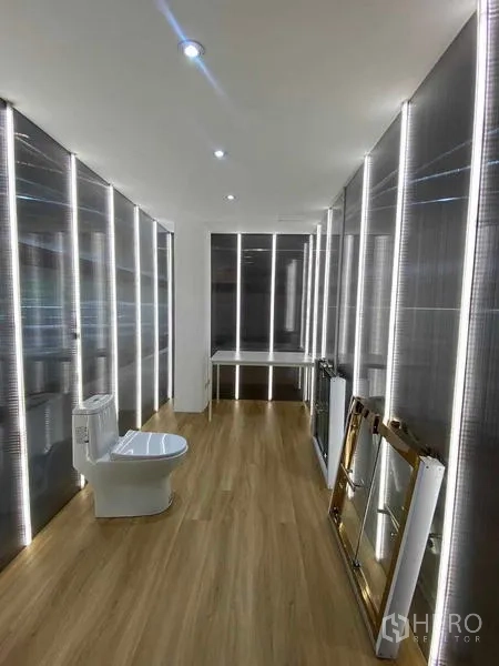 Home Office for rent in Wang Thonglang, Bangkok - LED-lit showroom room with a toilet, wood floor and stacked mirrors