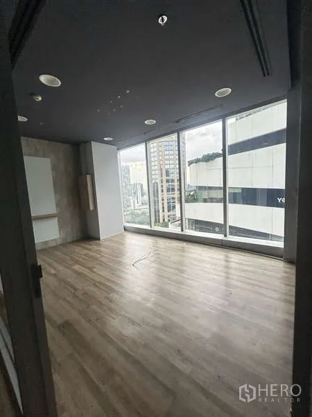 Office Space for rent - Corner office with full-height windows and city view