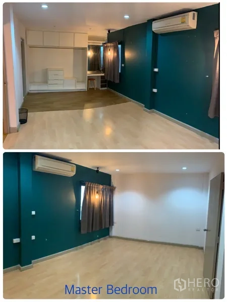 Townhouse for rent in Watthana, Bangkok - Large master bedroom with teal accent wall, wood flooring and built-in storage.