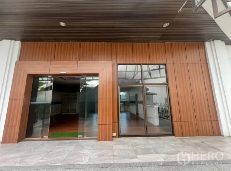 Retail Space for rent - Street-level retail shopfront with wood-clad facade and large glass doors in Thonglor, Watthana.