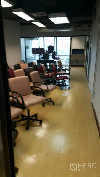 Office Space for rent in Khlong Toei, Bangkok - Training or seminar area with rows of office chairs beside a glass meeting room.