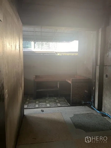 Retail Space for rent in Watthana, Bangkok - Rear preparation area with window, work counter, and utility hookups.