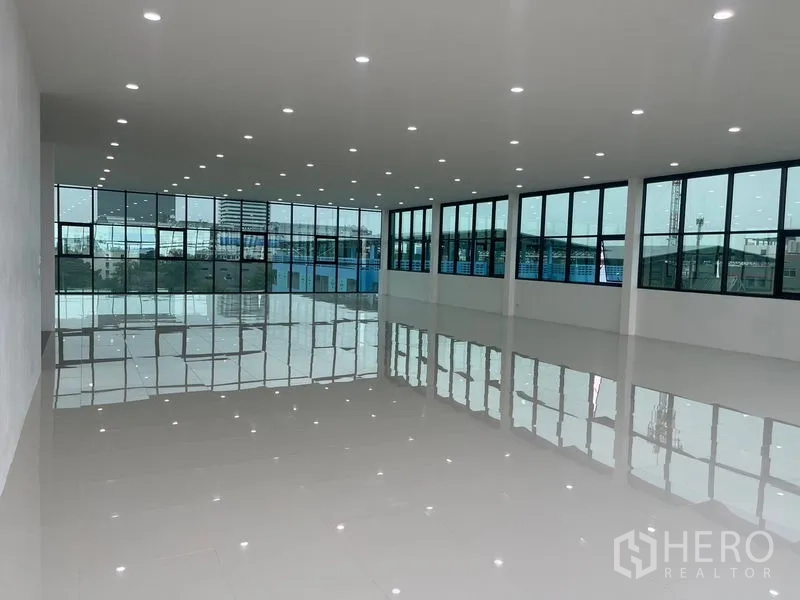 Home Office for rent or sale in Wang Thonglang, Bangkok - Open-plan office floor with panoramic windows and LED lighting.