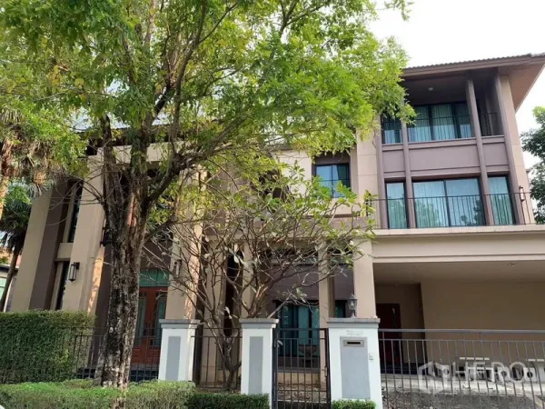 Detached House for rent or sale in Khan Na Yao, Bangkok - Three-storey detached house with gated frontage, carport and mature trees.