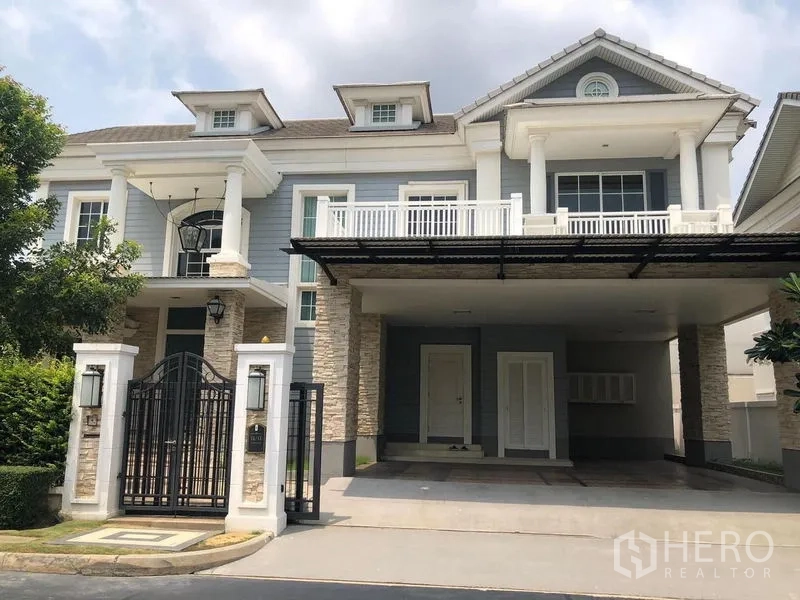 Detached House for rent or sale - Front exterior of the detached house with wrought-iron gate and double carport.