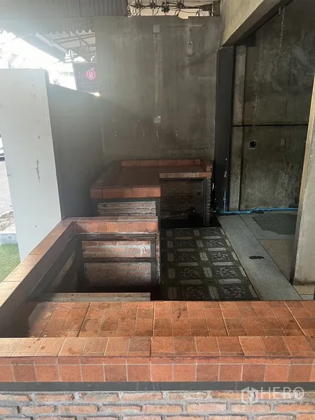 Retail Space for rent in Watthana, Bangkok - Built-in brick counter and tiled service area suitable for a cafe or bar setup.