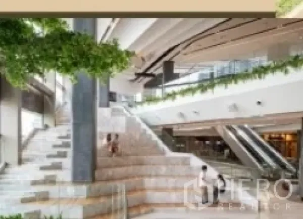 Office Space for rent in Ratchathewi, Bangkok - Retail podium with wide terraced steps, greenery and escalators in a mixed‑use complex.