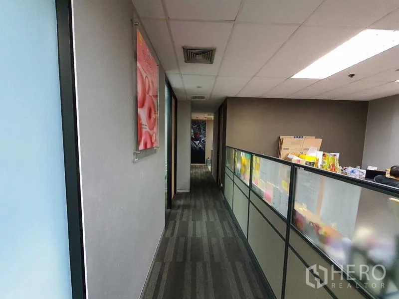 Office Space for rent in Watthana, Bangkok - Narrow corridor beside frosted-glass partitions and grey walls.