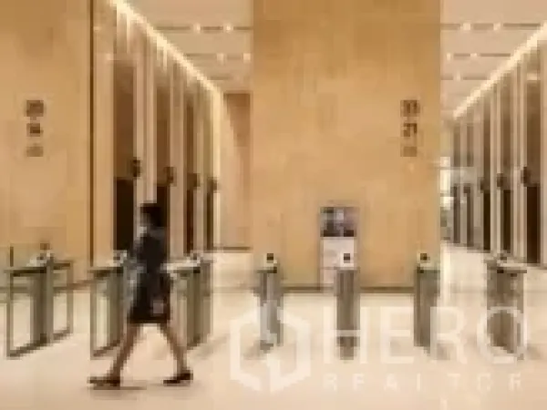 Office Space for rent in Ratchathewi, Bangkok - Modern grade‑A tower lobby with access‑controlled security turnstiles and stone finishes.