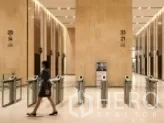 Office Space for rent in Ratchathewi, Bangkok - Modern grade‑A tower lobby with access‑controlled security turnstiles and stone finishes.