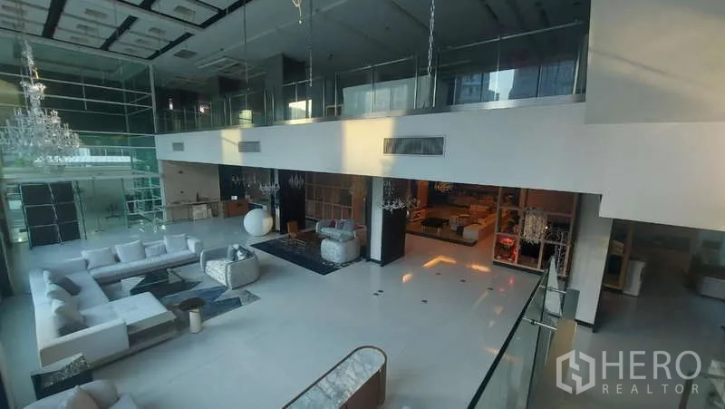 Retail Space for rent in Watthana, Bangkok - Mezzanine view over the double-height atrium with glass balustrade
