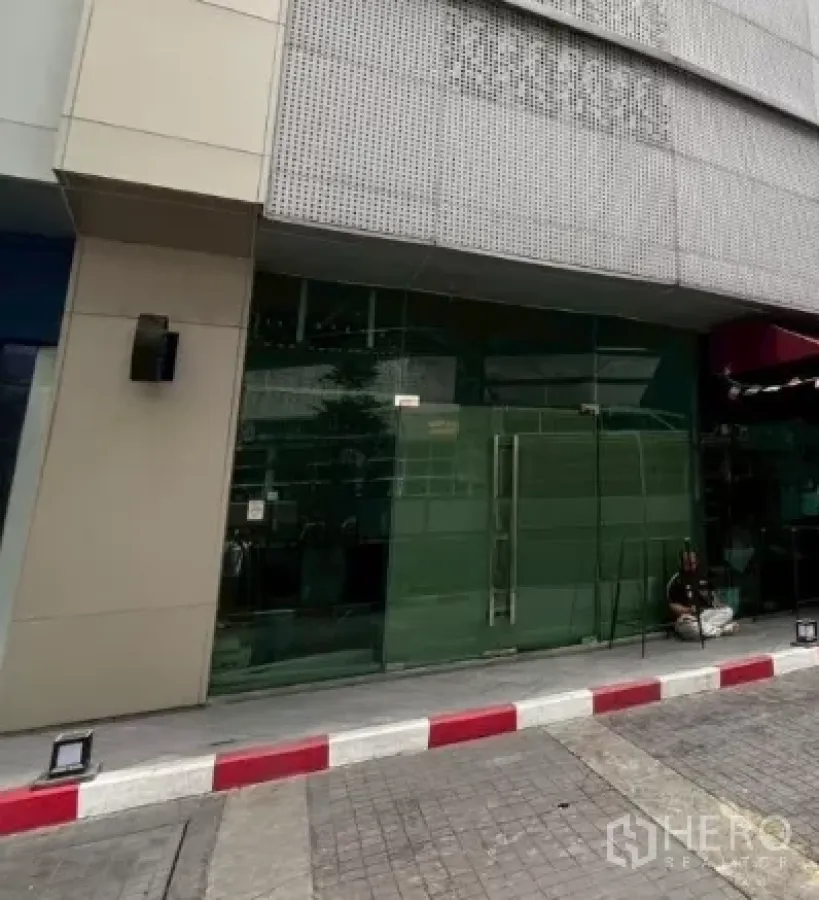 Retail Space for rent - Street-facing glass storefront of a ground-floor retail unit at W District in Watthana, Bangkok.