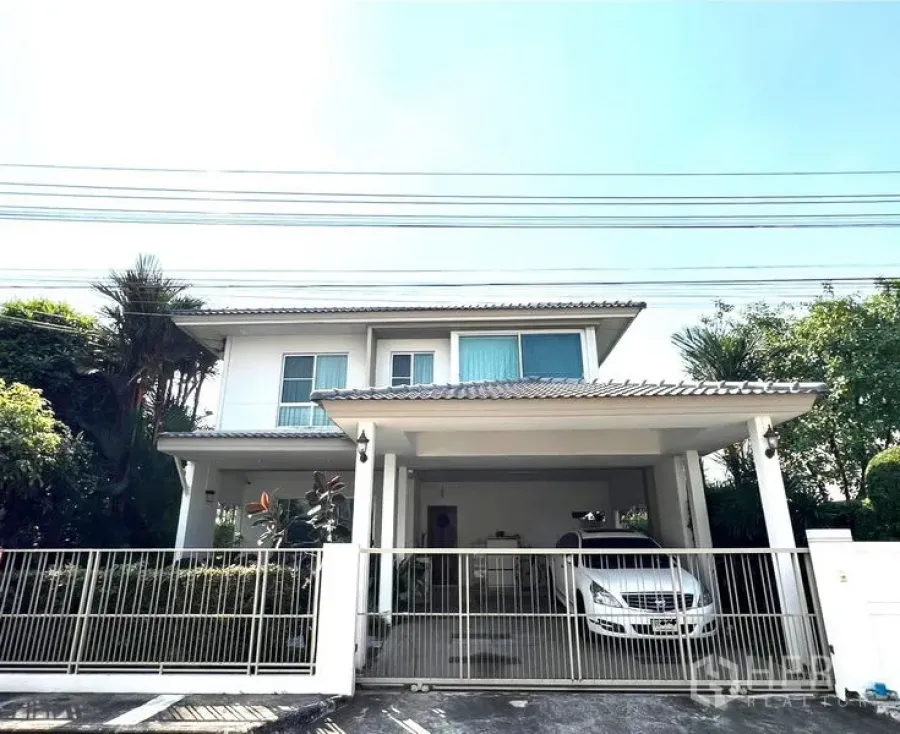 Detached House for rent in Bang Phli, Samut Prakan - Two-storey detached house with gated entrance and a covered two-car carport.