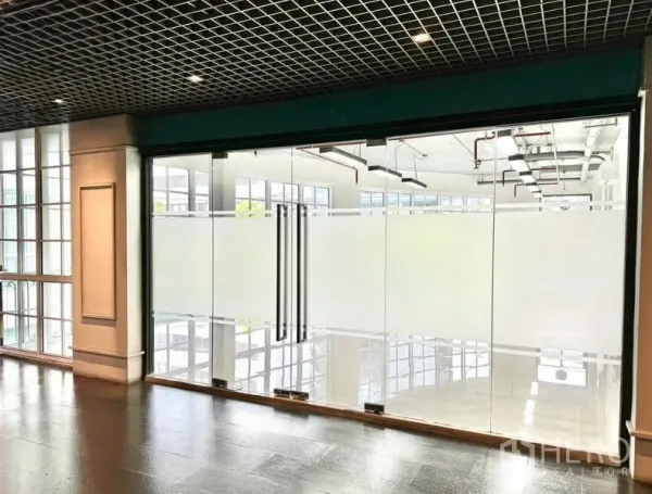 Office Space for rent in Khlong Toei, Bangkok - Glass-fronted office entrance with frosted panels and double doors