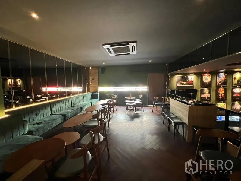 Retail Space for rent in Watthana, Bangkok - Spacious upstairs lounge with long sofa, DJ booth and herringbone timber floor.