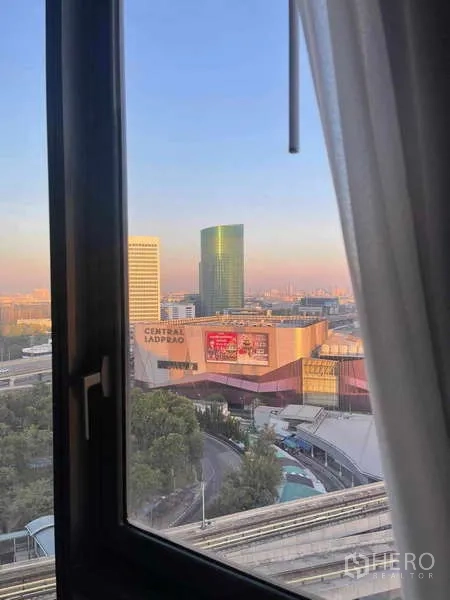 Condominium for rent - High-floor window view toward Central Ladprao mall and the Bangkok skyline.