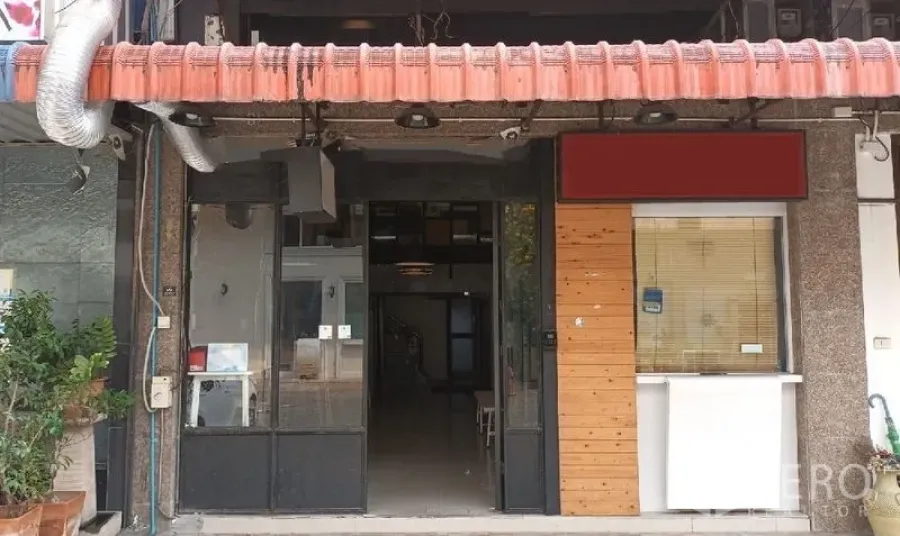 Retail Space for rent in Watthana, Bangkok - Street-facing shopfront with wide glass doors, display window and metal-framed entrance under awning.