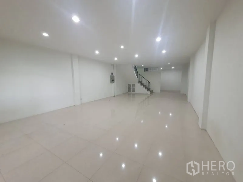 Home Office for rent or sale in Yan Nawa, Bangkok - Large open-plan floor with bright recessed lighting and glossy tiles.