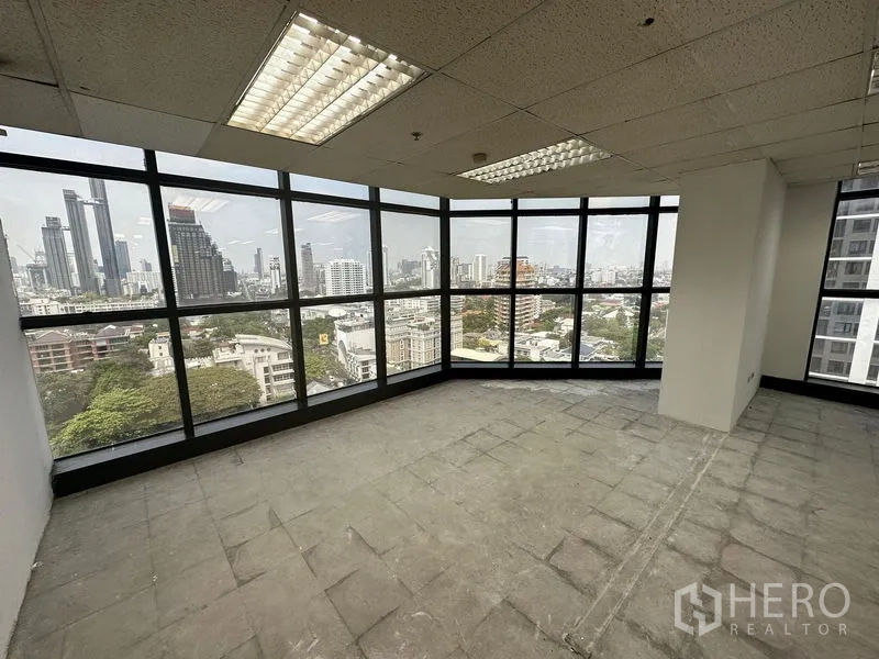 Office Space for rent - Corner meeting or work area with curved glass wall and skyline vistas across Ekkamai and Thonglor.