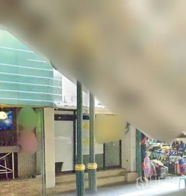 Retail Space for  in Watthana, Bangkok - Street-level shopfront with wide glass facade, covered sidewalk, and strong signage opportunity near BTS Nana in Bangkok.