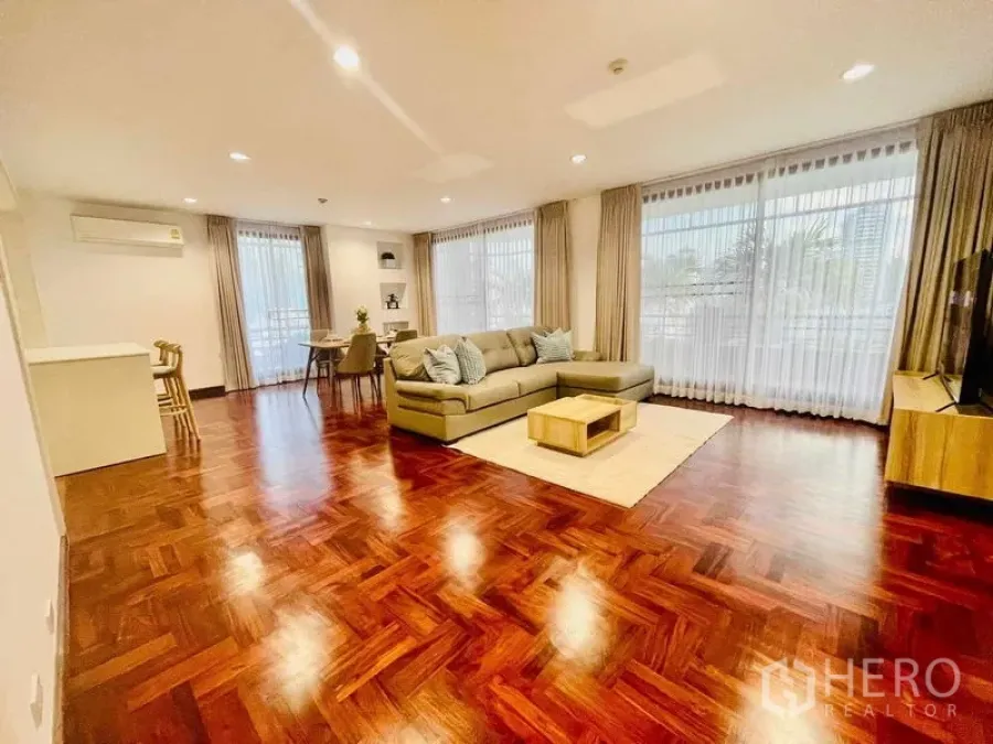 Condominium for rent - Open living space with glossy parquet flooring and ample natural light.