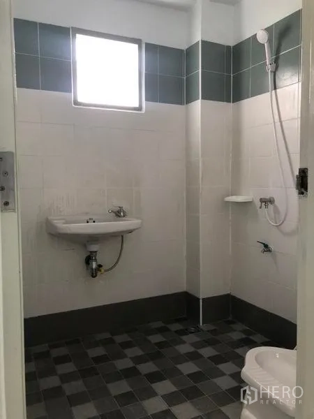 Factory for rent in Pak Kret, Nonthaburi - Restroom with shower, sink and tiled walls and flooring.