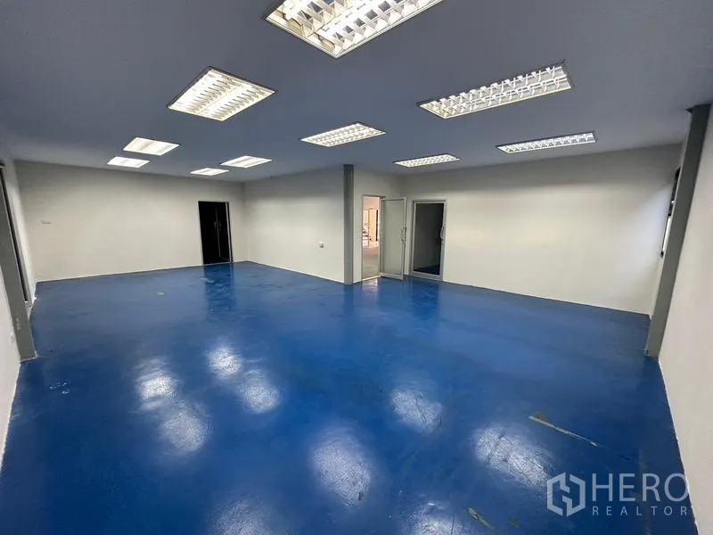 Office Space for rent - Blue epoxy-finished workspace suitable for production or lab use.