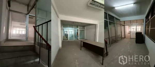 Shophouse for rent in Bang Rak, Bangkok - Upper-floor office area with glass partitions and lighting beside the stairwell.