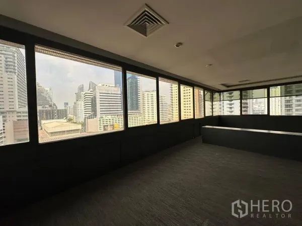 Office Space for rent in Watthana, Bangkok - Corner office with wraparound windows offering panoramic Asok skyline views