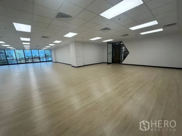 Office Space for rent in Chatuchak, Bangkok - Spacious 215 sqm open office with light wood flooring, LED ceiling lights and city outlook.