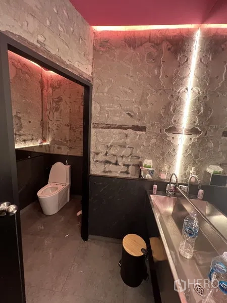 Retail Space for rent in Watthana, Bangkok - Restroom with dual stainless sinks and a separate toilet stall.
