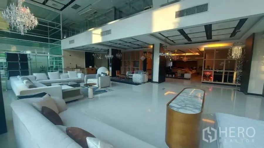 Retail Space for rent in Watthana, Bangkok - Grand double-height lobby with white sofas, chandeliers, and glass walls