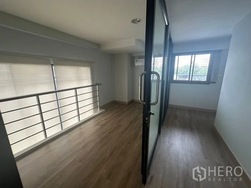 Home Office for rent in Suan Luang, Bangkok - Wide multipurpose room with AC and natural light from two sides.