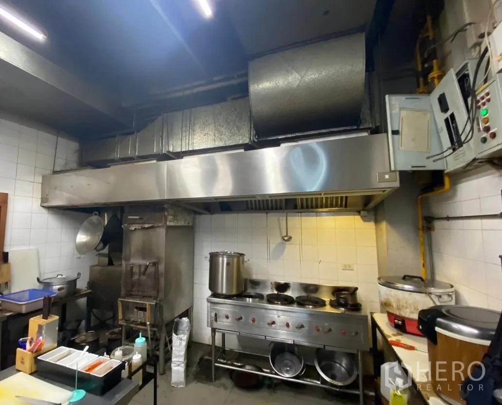 Retail Space for rent in Watthana, Bangkok - Commercial kitchen with stainless ventilation hood, gas range and prep counters